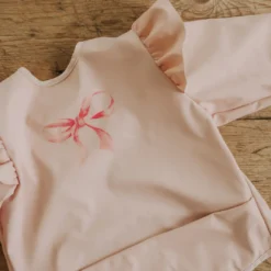 Långärmad Haklapp - Rosy Bow